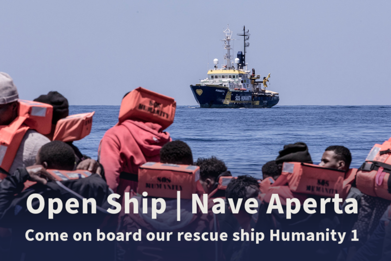 Picture from the mission of Humanity 1 with the text "Open Ship Nave Aperta"