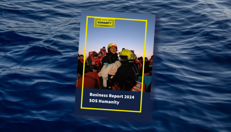 Picture of our Transparency Report 2024 infront of waves.